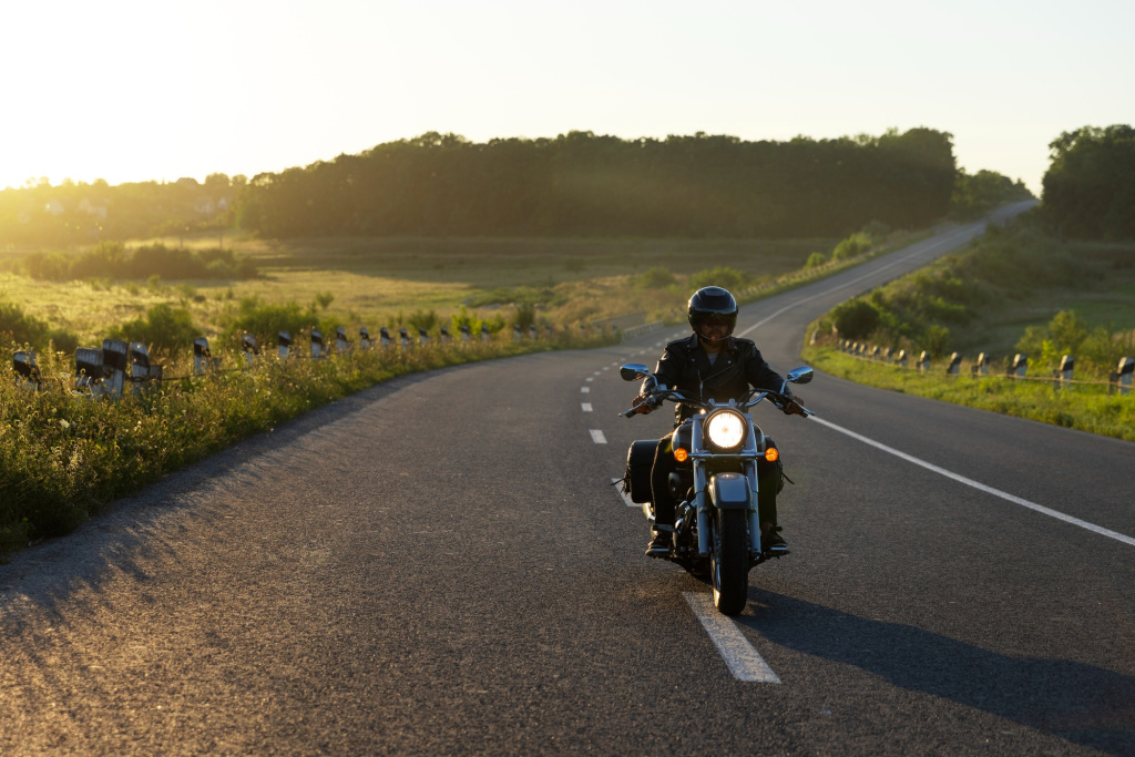 full-shot-man-riding-a-motorbike.jpg